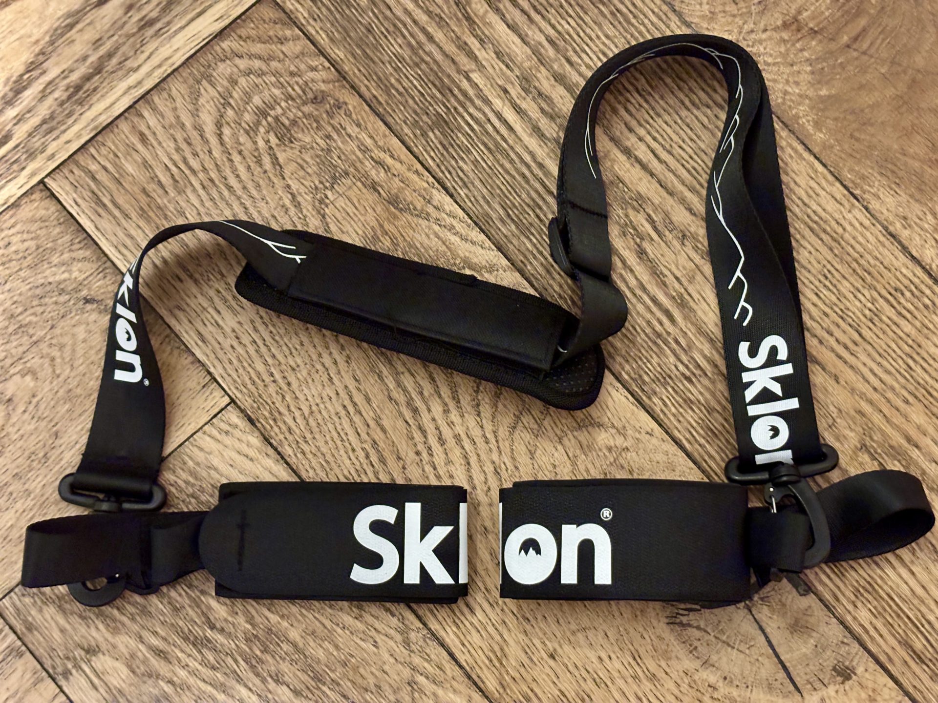 Sklon ski strap and pole carrier